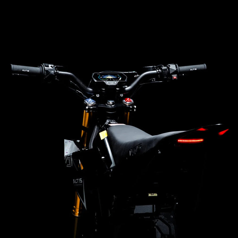 Altis Sigma seen from behind the seat, with the handlebars, lit display and red LED taillight