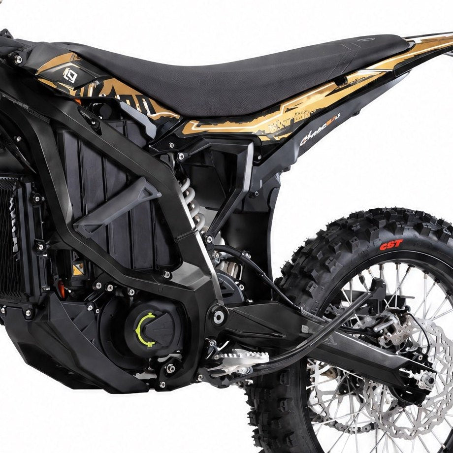 Gold and black decal set applied to the Surron Ultra Bee bodywork