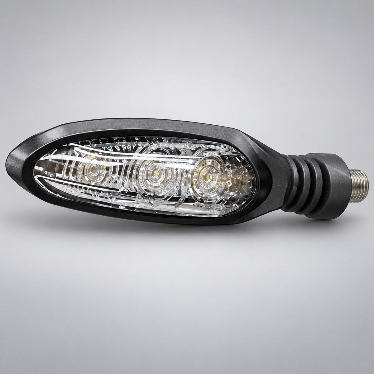 Front turn signal for the Surron Ultra Bee, matte black arrow housing with clear faceted lens and three LED reflectors