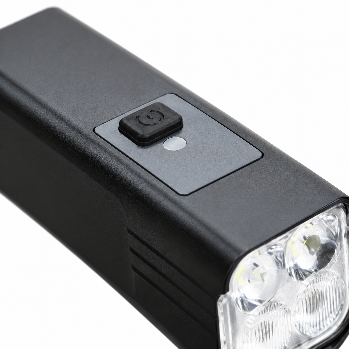 Close-up of the power button and indicator light on the VM USB Rechargeable Front Light