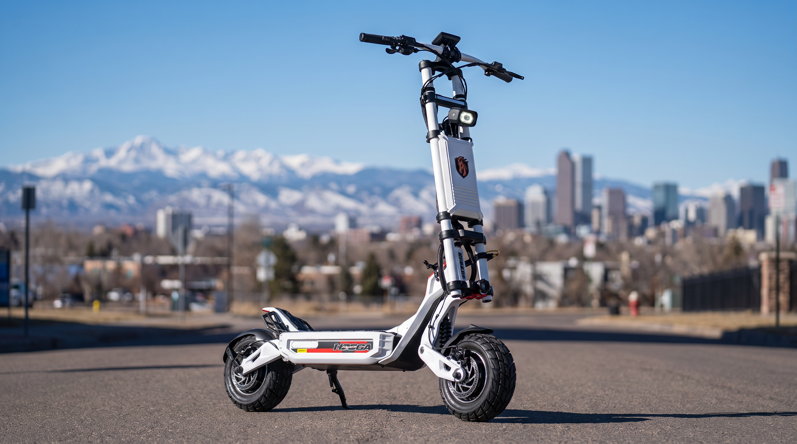 VoroMotors electric scooter with the Denver Rocky Mountains