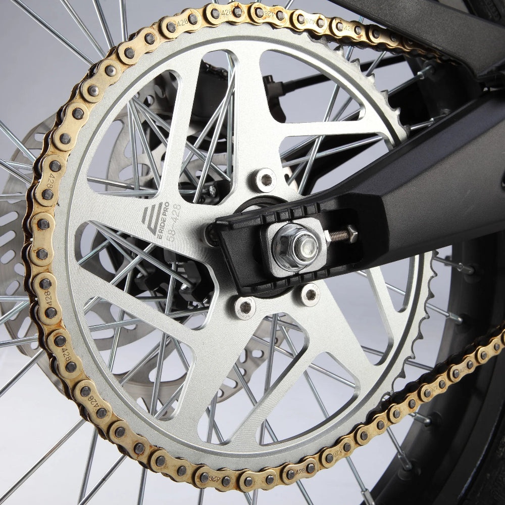 Chain drive, and a real sprocket.