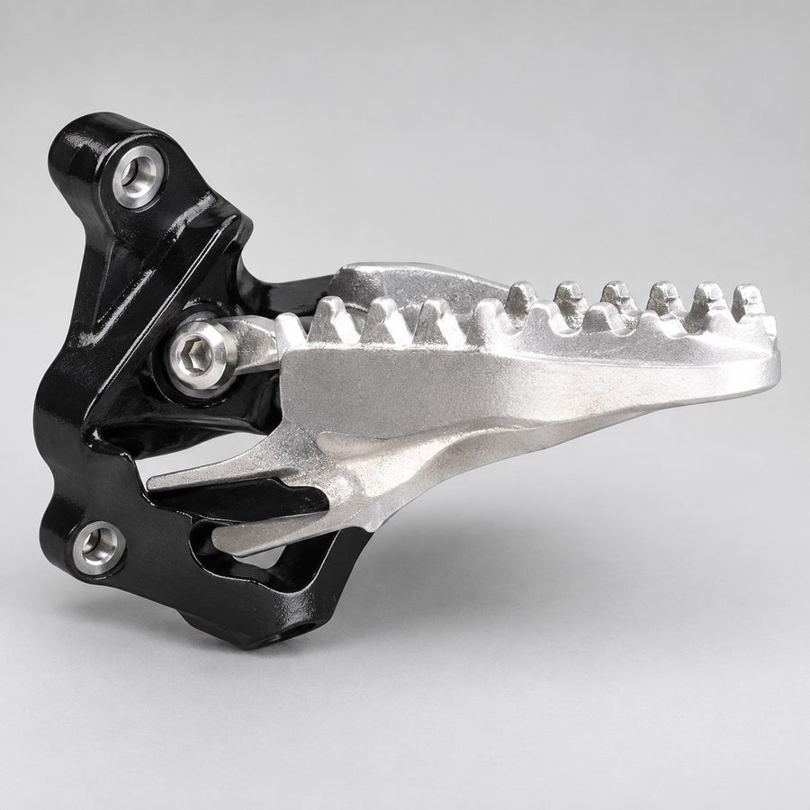 Foot peg with mount for the Surron Ultra Bee, serrated alloy platform on a black steel bracket