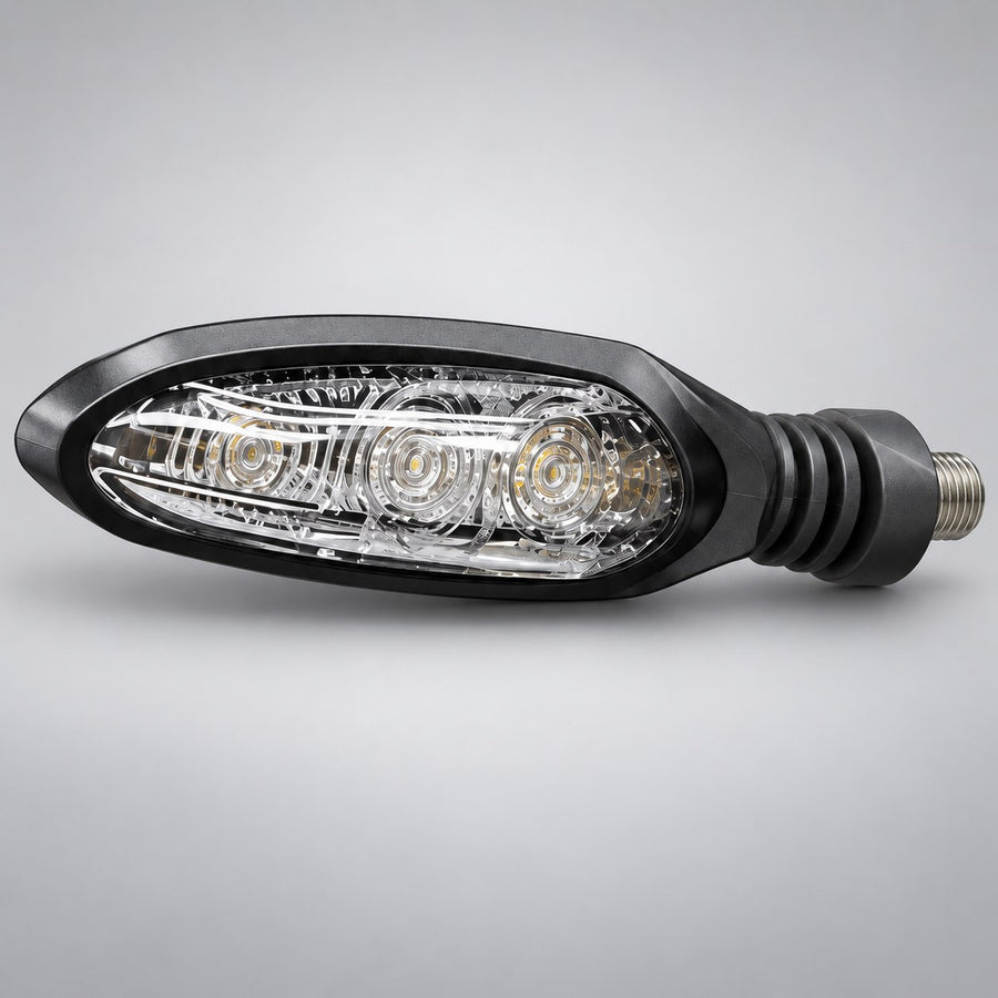 Front turn signal for the Surron Ultra Bee, matte black arrow housing with clear faceted lens and three LED reflectors