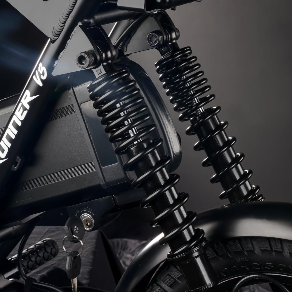 Hydraulic front, twin springs rear.