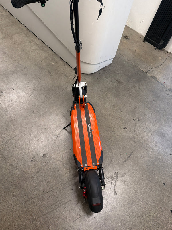 Open Box — EMOVE Cruiser 52V 1600W Dual Suspension Foldable Electric Scooter - Orange (Unit OB-0017)