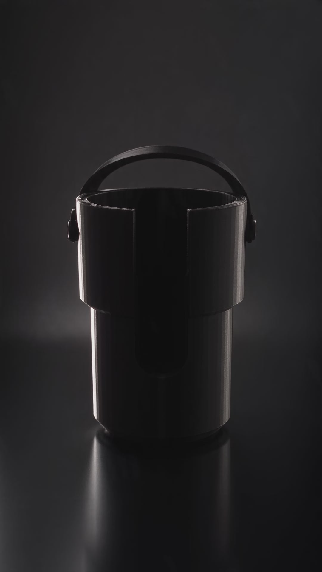 Product intro: a tumbler drops into the holder, the handle slides down the slot and the strap closes over the lid