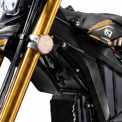 Suspension reflector fitted on the front fork of the Surron Ultra Bee